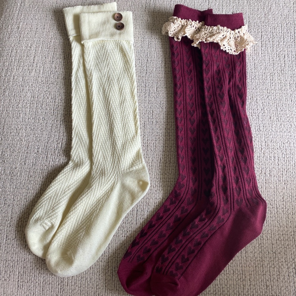 Two pairs of high boot socks